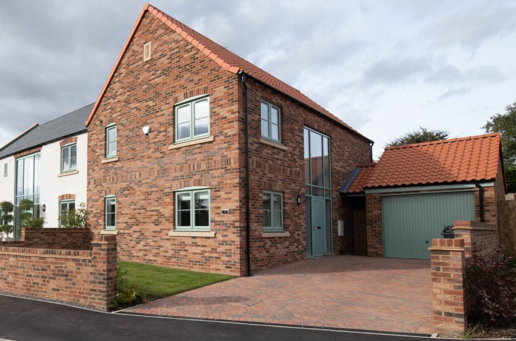 new build with garage in marton cum grafton