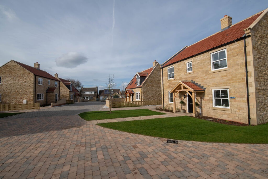 street view of completed new builds with lawns in swainby